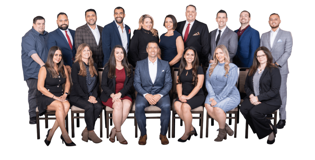 The Family Office Club team seated and standing in two rows