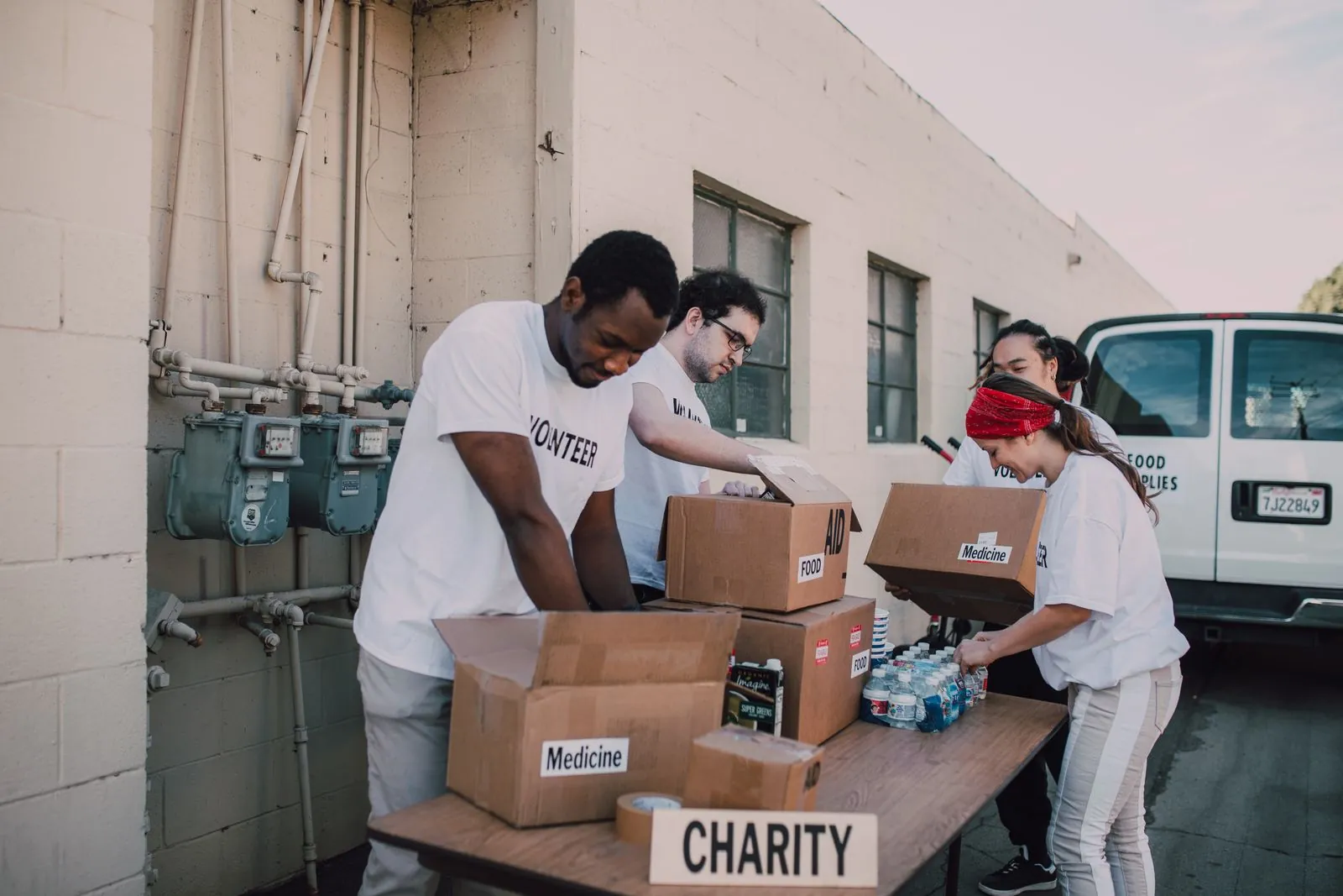 Volunteers packing donation boxes for a charity